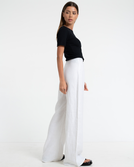 Woman in Bow & Arrow Margot Linen Flare Pant Chalk