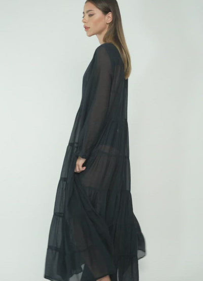 Woman in Bow & Arrow Alice Sheer Maxi Dress Black