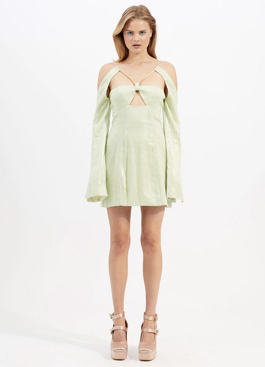 A woman in Alice McCall Night Sky Mini Dress