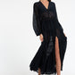 Woman in Bow & Arrow Alice Sheer Maxi Dress Black