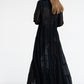 Woman in Bow & Arrow Alice Sheer Maxi Dress Black