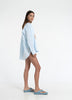 Woman in Bow and Arrow Devin Oversize Shirt Pastel Blue