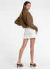 Woman in Bow and Arrow Rei Elasticated Skirt Chalk