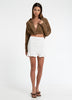 Woman in Bow and Arrow Rei Elasticated Skirt Chalk