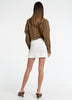 Woman in Bow and Arrow Rei Elasticated Skirt Chalk
