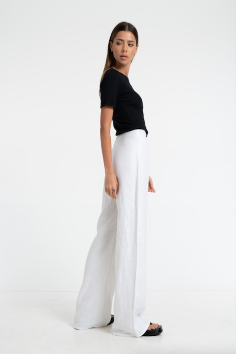 Woman in Bow & Arrow Margot Linen Flare Pant Chalk